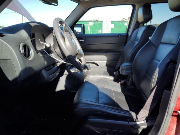 2016 Jeep Patriot High Altitude Edition with VIN 1C4NJRFB3GD658463, listed as a Copart auction lot 82340864 with 77,959 mi miles and Salvage Title. Bid and sale history available at carsss.com. Image 7.
