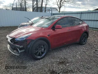 2024 Tesla Model Y Long Range z VIN 7SAYGDEE8RA302077, wystawiony jako Copart lot #52622465 z przebiegiem 11 830 mil mil oraz Szkoda całkowita • Salvage title. Historia ofert i sprzedaży dostępna na DreamBid. Obrazek 1.