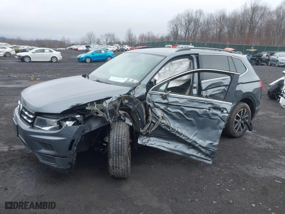 2020 Volkswagen Tiguan SE with VIN 3VV3B7AX0LM086621, listed as a IAAI auction lot 41941639 with 86,732 mi miles. Bid and sale history available at carsss.com. Image 2.