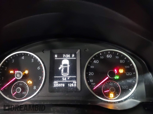 2012 Volkswagen Tiguan S with VIN WVGBV7AX2CW002991, listed as a IAAI auction lot 42031877 with 205,979 mi miles and . Bid and sale history available at DreamBid. Image 7.