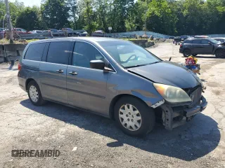 2010 Honda Odyssey LX with VIN 5FNRL3H22AB062721, listed as a Copart auction lot 62379995 with 138,080 mi miles and Salvage title. Bid and sale history available at DreamBid. Image 4.