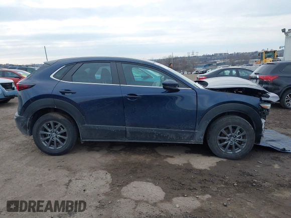 2022 Mazda CX-30 S with VIN 3MVDMBAL8NM411739, listed as a IAAI auction lot 41668265 with 34,964 mi miles and . Bid and sale history available at carsss.com. Image 12.