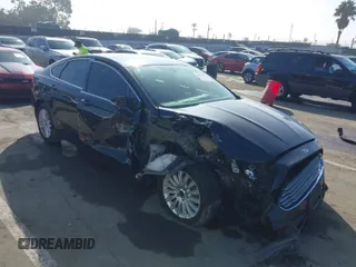 2013 Ford Fusion SE Hybrid with VIN 3FA6P0LU4DR325699, listed as a IAAI auction lot 41677237 with 129,004 mi miles. Bid and sale history available at carsss.com. Image 1.