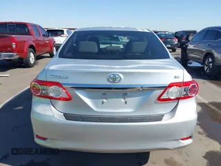 2011 Toyota Corolla L with VIN JTDBU4EE0B9151332, listed as a IAAI auction lot 41970433 with 113,157 mi miles. Bid and sale history available at carsss.com. Image 16.