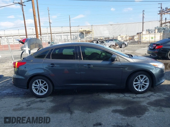 2018 Ford Focus SE with VIN 1FADP3F27JL285891, listed as a IAAI auction lot 41750264 with 103,815 mi miles. Bid and sale history available at carsss.com. Image 13.