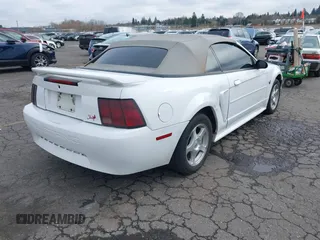 2004 Ford Mustang Deluxe with VIN 1FAFP446X4F134860, listed as a IAAI auction lot 41755643 with 174,410 mi miles. Bid and sale history available at carsss.com. Image 4.
