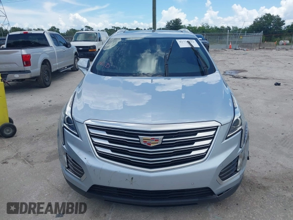 2017 Cadillac XT5 Luxury FWD z VIN 1GYKNBRSXHZ325914, wystawiony jako IAAI lot #42776412 z przebiegiem 85 014 mil mil oraz . Historia ofert i sprzedaży dostępna na DreamBid. Obrazek 12.