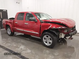 2010 Dodge Dakota with VIN 1D7CE5GP5AS100833, listed as a IAAI auction lot 41575402 with 103,628 mi miles and . Bid and sale history available at DreamBid. Image 1.