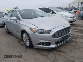 2016 Ford Fusion Energi SE Luxury with VIN 3FA6P0PU9GR357076, listed as a IAAI auction lot 42081615 with 174,234 mi miles. Bid and sale history available at carsss.com. Image 1.