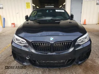 2015 BMW 2 Series M235i xDrive with VIN WBA1J9C53FV371160, listed as a Copart auction lot 77395844 with 148,064 mi miles and Clean Title. Bid and sale history available at carsss.com. Image 5.