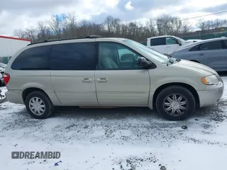 2006 Chrysler Town & Country LWB Touring with VIN 2A8GP54L86R887561, listed as a IAAI auction lot 41235389 with 124,554 mi miles. Bid and sale history available at carsss.com. Image 13.