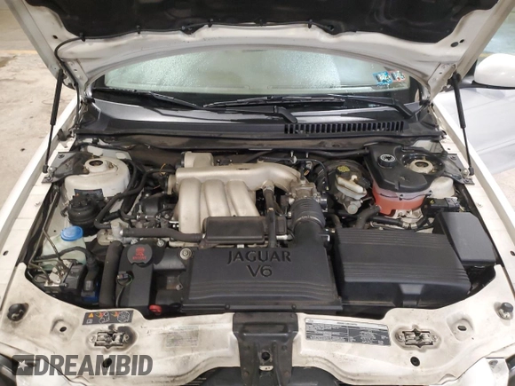 2004 Jaguar X-Type with VIN SAJEA51C34WE06046, listed as a Copart auction lot 56982105 with 69,265 mi miles and Clean Title. Bid and sale history available at DreamBid. Image 11.