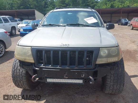 2004 Jeep Grand Cherokee Laredo with VIN 1J4GW48S34C354006, listed as a IAAI auction lot 42599812 with 258,004 mi miles and . Bid and sale history available at DreamBid. Image 6.