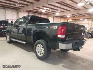 2013 GMC Sierra 2500HD SLT with VIN 1GT121EG3DF111218, listed as a IAAI auction lot 41566667 with 175,686 mi miles. Bid and sale history available at carsss.com. Image 3.