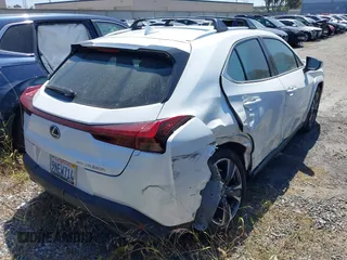 2024 Lexus UX 250h Premium with VIN JTHP9JBH3R2077751, listed as a IAAI auction lot 41943549 with 3,497 mi miles and . Bid and sale history available at DreamBid. Image 4.