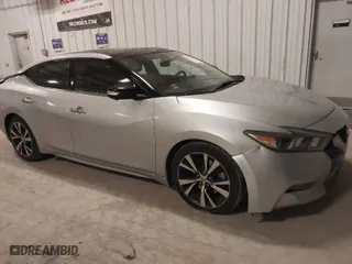 2017 Nissan Maxima SR with VIN 1N4AA6AP0HC448285, listed as a IAAI auction lot 41397027 with 91,557 mi miles. Bid and sale history available at carsss.com. Image 14.