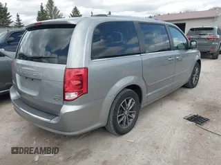 2017 Dodge Grand Caravan SXT with VIN 2C4RDGCG6HR671199, listed as a IAAI auction lot 42031157 with 99,189 mi miles and . Bid and sale history available at DreamBid. Image 4.