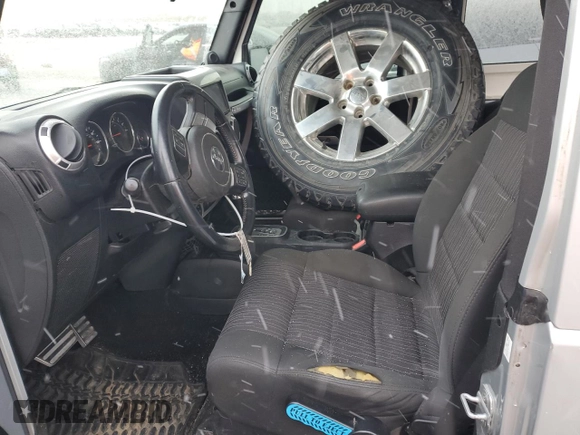 2012 Jeep Wrangler Arctic with VIN 1C4AJWBG4CL131823, listed as a Copart auction lot 87161194 with 152,124 mi miles and Clean title. Bid and sale history available at DreamBid. Image 7.