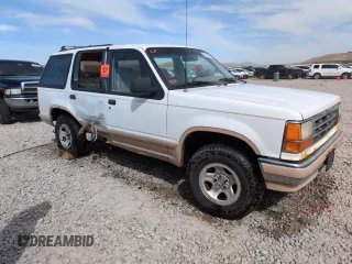 1992 Ford Explorer Eddie Bauer with VIN 1FMDU34X2NUE11927, listed as a Copart auction lot 52094875 with 53,449 mi miles and Salvage title. Bid and sale history available at DreamBid. Image 4.