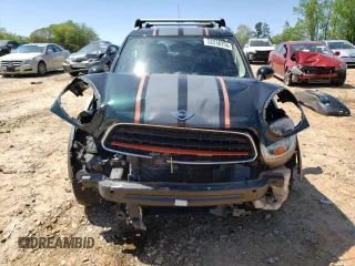 2011 MINI Countryman with VIN WMWZB3C53BWH95264, listed as a Copart auction lot 52238255 with 130,031 mi miles and Salvage Title. Bid and sale history available at DreamBid. Image 5.