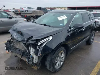 2021 Cadillac XT5 FWD Premium Luxury with VIN 1GYKNCRS3MZ103893, listed as a IAAI auction lot 41286761 with 75,728 mi miles and . Bid and sale history available at carsss.com. Image 2.
