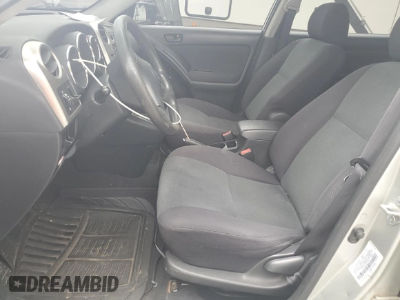 2003 Toyota Matrix Std with VIN 2T1KR32E73C124186, listed as a Copart auction lot 55576035 with 144,144 mi miles and Salvage Title. Bid and sale history available at DreamBid. Image 7.