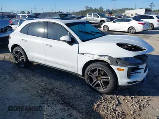 2021 Porsche Macan with VIN WP1AA2A54MLB10902, listed as a IAAI auction lot 40942913 with 62,910 mi miles and . Bid and sale history available at DreamBid. Image 1.