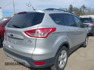 2016 Ford Escape SE with VIN 1FMCU9GXXGUB10447, listed as a IAAI auction lot 41879610 with 137,913 mi miles. Bid and sale history available at carsss.com. Image 4.