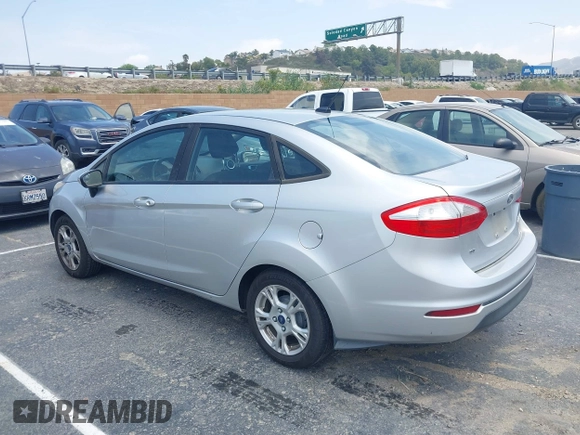2016 Ford Fiesta SE with VIN 3FADP4BJ6GM122174, listed as a IAAI auction lot 42161294 with 138,090 mi miles. Bid and sale history available at carsss.com. Image 3.
