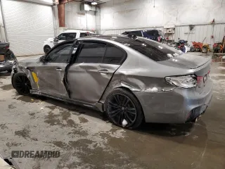 2019 BMW M5 with VIN WBSJF0C50KB447597, listed as a Copart auction lot 45179115 with 40,600 mi miles and Salvage Title. Bid and sale history available at carsss.com. Image 2.