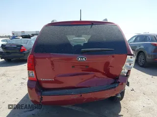 2012 Kia Sedona LX with VIN KNDMG4C70C6463190, listed as a IAAI auction lot 41781336 with 179,860 mi miles. Bid and sale history available at carsss.com. Image 16.
