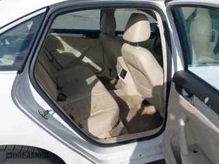 2013 Volkswagen Passat SE w/Sunroof with VIN 1VWBH7A30DC080176, listed as a IAAI auction lot 40941070 with 155,815 mi miles. Bid and sale history available at carsss.com. Image 8.