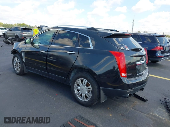 2013 Cadillac SRX Premium Collection with VIN 3GYFNEE34DS535613, listed as a IAAI auction lot 42336365 with 106,426 mi miles and . Bid and sale history available at DreamBid. Image 3.