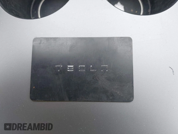 2021 Tesla Model Y Long Range with VIN 5YJYGAEE1MF149887, listed as a IAAI auction lot 42032104 with 54,932 mi miles. Bid and sale history available at carsss.com. Image 11.