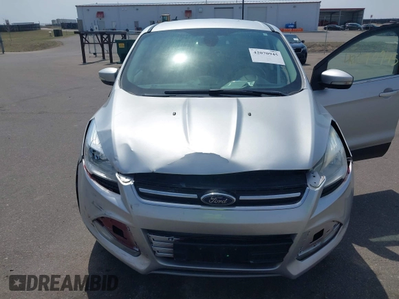 2013 Ford Escape SEL with VIN 1FMCU9H99DUA74813, listed as a IAAI auction lot 42070945 with 187,417 mi miles and . Bid and sale history available at DreamBid. Image 6.