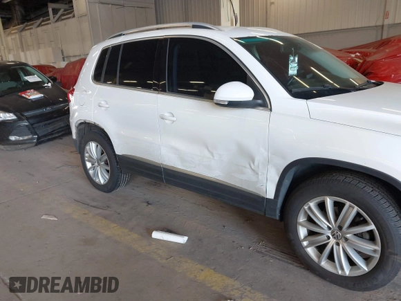 2012 Volkswagen Tiguan S z VIN WVGBV7AXXCW572690, wystawiony jako IAAI lot #42074464 z przebiegiem 133 049 mil mil oraz . Historia ofert i sprzedaży dostępna na DreamBid. Obrazek 15.