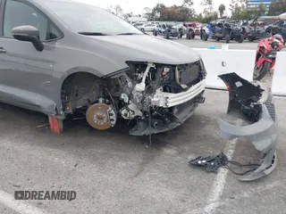 2023 Chrysler Pacifica Hybrid Touring L with VIN 2C4RC1L71PR584485, listed as a IAAI auction lot 42056423 with 58,955 mi miles and . Bid and sale history available at DreamBid. Image 6.