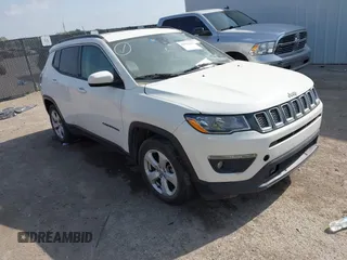 2021 Jeep Compass Latitude with VIN 3C4NJCBBXMT563942, listed as a IAAI auction lot 42045108 with 166,153 mi miles and . Bid and sale history available at DreamBid. Image 1.