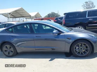 2023 Tesla Model 3 with VIN 5YJ3E1EA1PF545402, listed as a IAAI auction lot 42671354 with 37,948 mi miles and . Bid and sale history available at DreamBid. Image 14.