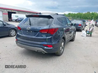 2017 Hyundai Santa Fe 2.4L z VIN 5XYZUDLB0HG418726, wystawiony jako IAAI lot #42375177 z przebiegiem 159 118 mil mil oraz . Historia ofert i sprzedaży dostępna na DreamBid. Obrazek 4.