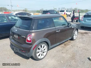 2011 MINI Cooper Hardtop S with VIN WMWSV3C5XBTY14285, listed as a IAAI auction lot 42035836 with 111,479 mi miles. Bid and sale history available at carsss.com. Image 4.