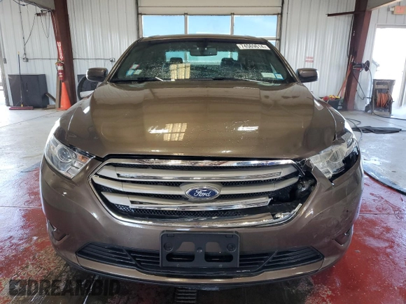 2015 Ford Taurus SEL with VIN 1FAHP2E94FG157022, listed as a Copart auction lot 74569614 with 133,223 mi miles and Salvage Title. Bid and sale history available at DreamBid. Image 5.