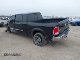 2014 Ram 2500 Longhorn with VIN 3C6UR5PL9EG207565, listed as a IAAI auction lot 41511580 with 125,266 mi miles. Bid and sale history available at carsss.com. Image 3.