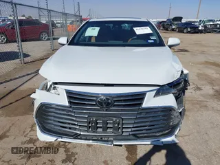 2019 Toyota Avalon XLE with VIN 4T1BZ1FB8KU030044, listed as a IAAI auction lot 41436242 with 56,261 mi miles and . Bid and sale history available at carsss.com. Image 13.