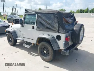 2005 Jeep Wrangler X with VIN 1J4FA39S75P321815, listed as a IAAI auction lot 42736150 with 141,914 mi miles and . Bid and sale history available at DreamBid. Image 3.