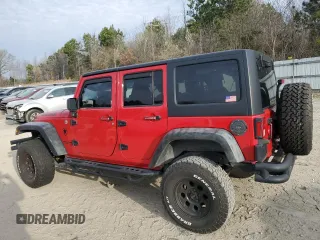 2014 Jeep Wrangler Unlimited Sport with VIN 1C4HJWDG6EL280653, listed as a Copart auction lot 48851205 with 125,211 mi miles and Salvage Title. Bid and sale history available at DreamBid. Image 2.