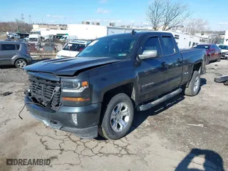 2017 Chevrolet Silverado 1500 LT with VIN 1GCVKREC1HZ342782, listed as a IAAI auction lot 41595845 with 86,000 mi miles. Bid and sale history available at carsss.com. Image 2.