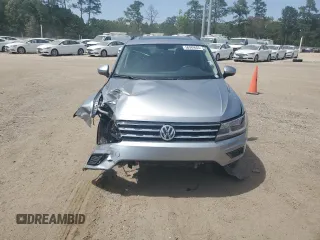 2021 Volkswagen Tiguan SE z VIN 3VV3B7AX9MM086196, wystawiony jako Copart lot #56989655 z przebiegiem 67 004 mil mil oraz Szkoda całkowita • Salvage title. Historia ofert i sprzedaży dostępna na DreamBid. Obrazek 5.
