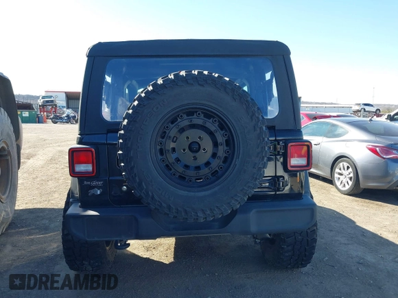 2021 Jeep Wrangler Sport with VIN 1C4GJXAG8MW559296, listed as a IAAI auction lot 41759848 with 47,374 mi miles and . Bid and sale history available at DreamBid. Image 16.
