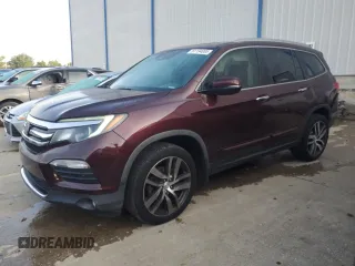2017 Honda Pilot Touring with VIN 5FNYF6H99HB004116, listed as a Copart auction lot 61194085 with 98,659 mi miles and Salvage title. Bid and sale history available at DreamBid. Image 1.